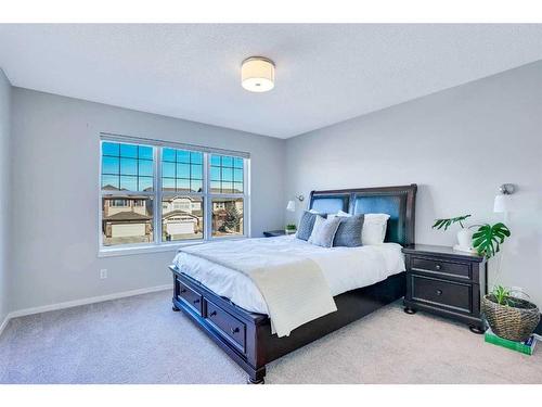 565 Panamount Boulevard Nw, Calgary, AB - Indoor Photo Showing Bedroom