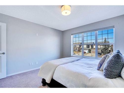 565 Panamount Boulevard Nw, Calgary, AB - Indoor Photo Showing Bedroom