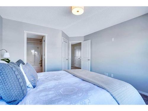 565 Panamount Boulevard Nw, Calgary, AB - Indoor Photo Showing Bedroom