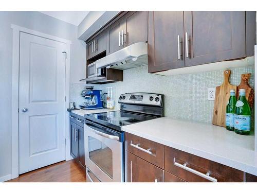 565 Panamount Boulevard Nw, Calgary, AB - Indoor Photo Showing Kitchen