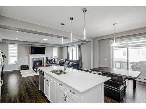 40 Cityscape Crescent Ne, Calgary, AB - Indoor Photo Showing Kitchen With Fireplace With Double Sink