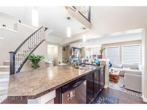 53 Auburn Bay Green Se, Calgary, AB - Indoor Photo Showing Kitchen With Double Sink