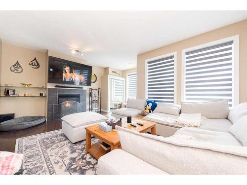 53 Auburn Bay Green Se, Calgary, AB - Indoor Photo Showing Living Room With Fireplace