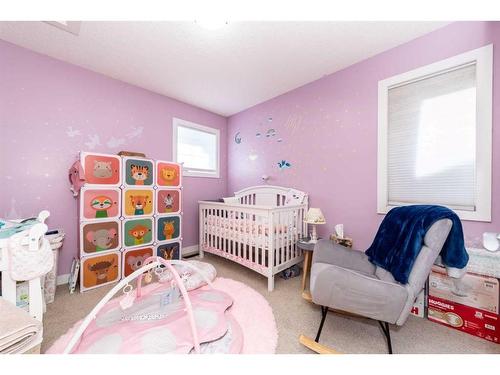 53 Auburn Bay Green Se, Calgary, AB - Indoor Photo Showing Bedroom