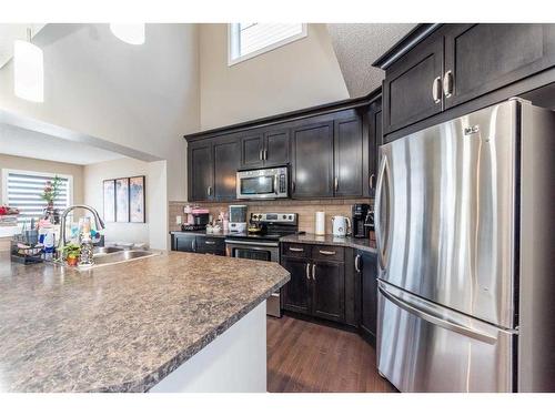 53 Auburn Bay Green Se, Calgary, AB - Indoor Photo Showing Kitchen With Double Sink With Upgraded Kitchen