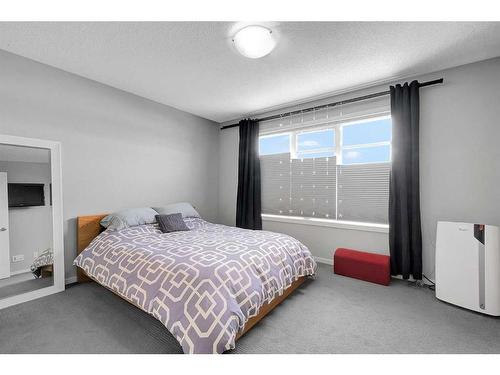 810 Walden Drive Se, Calgary, AB - Indoor Photo Showing Bedroom