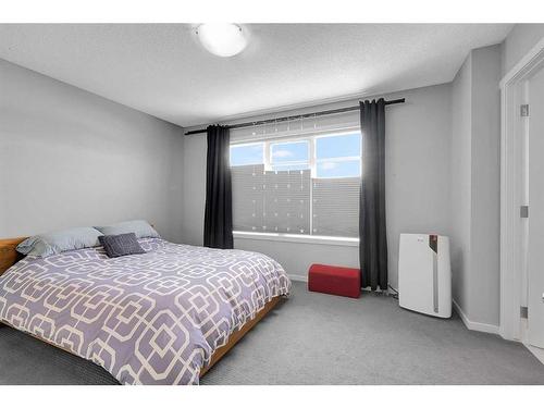 810 Walden Drive Se, Calgary, AB - Indoor Photo Showing Bedroom