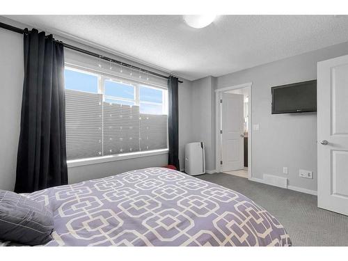 810 Walden Drive Se, Calgary, AB - Indoor Photo Showing Bedroom