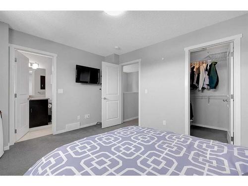 810 Walden Drive Se, Calgary, AB - Indoor Photo Showing Bedroom