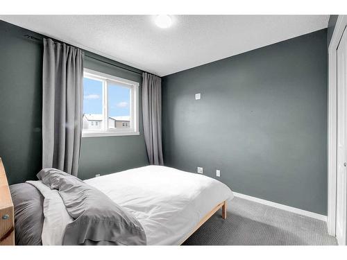 810 Walden Drive Se, Calgary, AB - Indoor Photo Showing Bedroom