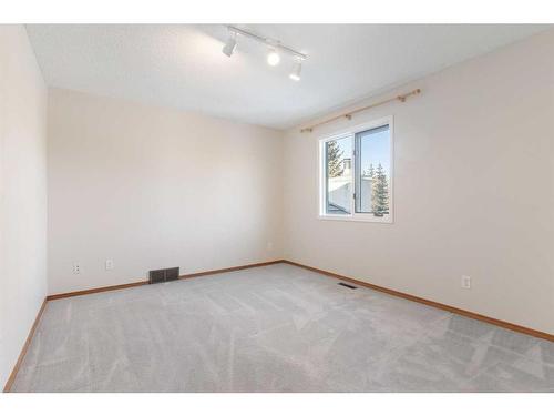 100 Anatapi Lane Sw, Calgary, AB - Indoor Photo Showing Other Room