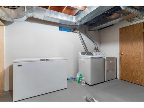 100 Anatapi Lane Sw, Calgary, AB - Indoor Photo Showing Laundry Room