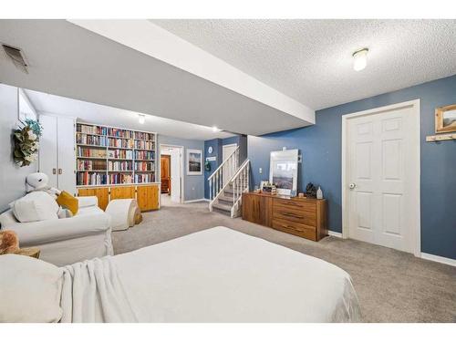 391 Millrise Drive Sw, Calgary, AB - Indoor Photo Showing Bedroom