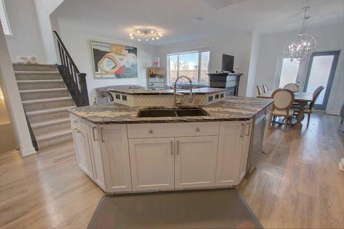 178 Autumn Circle Se, Calgary, AB - Indoor Photo Showing Kitchen With Double Sink