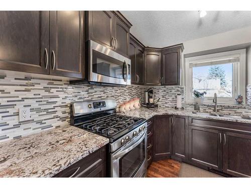 20 Sun Harbour Close Se, Calgary, AB - Indoor Photo Showing Kitchen With Upgraded Kitchen