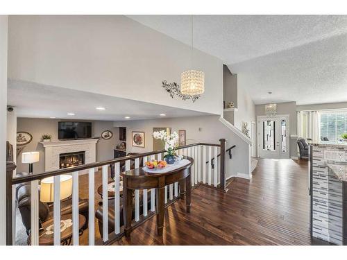 20 Sun Harbour Close Se, Calgary, AB - Indoor With Fireplace