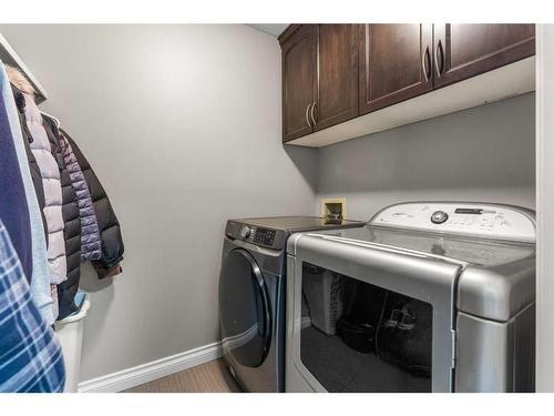 20 Sun Harbour Close Se, Calgary, AB - Indoor Photo Showing Laundry Room