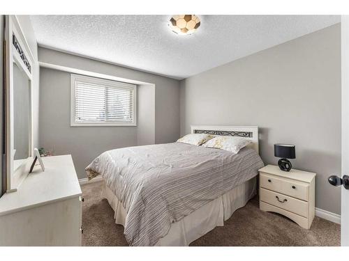 20 Sun Harbour Close Se, Calgary, AB - Indoor Photo Showing Bedroom