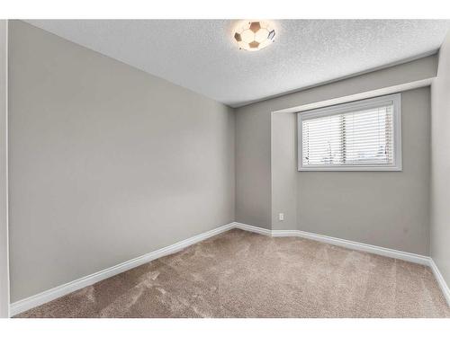 20 Sun Harbour Close Se, Calgary, AB - Indoor Photo Showing Other Room