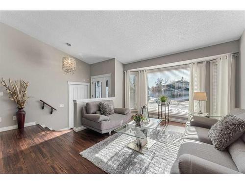 20 Sun Harbour Close Se, Calgary, AB - Indoor Photo Showing Living Room