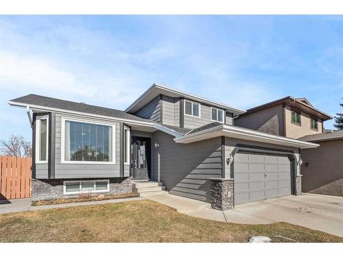 20 Sun Harbour Close Se, Calgary, AB - Outdoor With Facade