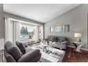 20 Sun Harbour Close Se, Calgary, AB  - Indoor Photo Showing Living Room 