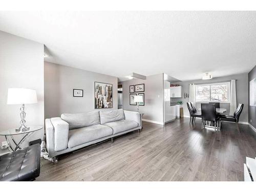 1203 Mackid Road Ne, Calgary, AB - Indoor Photo Showing Living Room