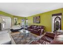 218 Coral Keys Court Ne, Calgary, AB  - Indoor Photo Showing Living Room 