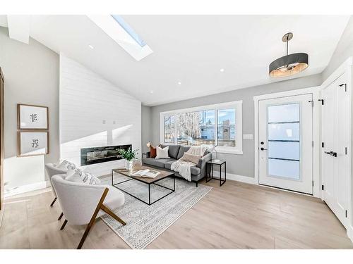 609 Willowburn Crescent Se, Calgary, AB - Indoor Photo Showing Living Room With Fireplace