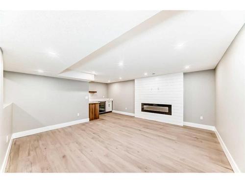 609 Willowburn Crescent Se, Calgary, AB - Indoor With Fireplace