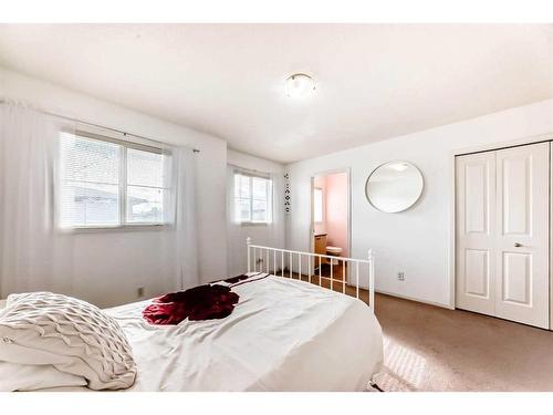 62 Eversyde Common Sw, Calgary, AB - Indoor Photo Showing Bedroom