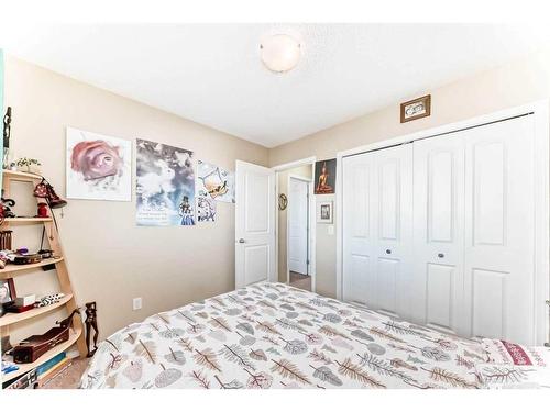 62 Eversyde Common Sw, Calgary, AB - Indoor Photo Showing Bedroom