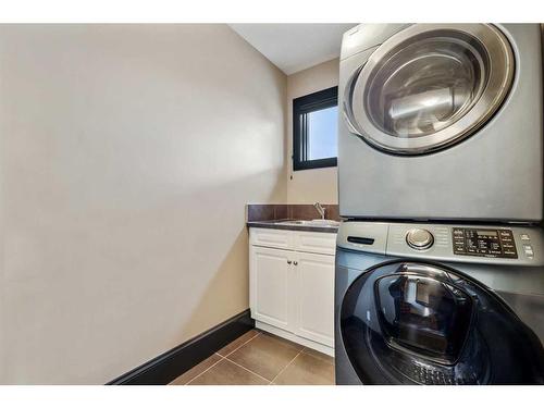 43 Cranleigh Manor Se, Calgary, AB - Indoor Photo Showing Laundry Room