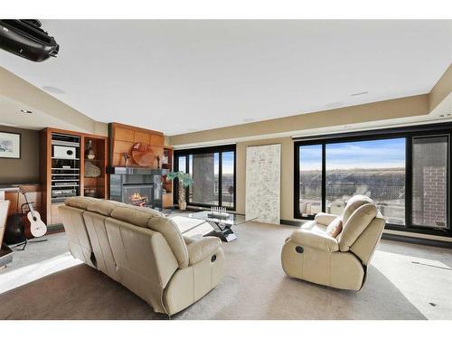 43 Cranleigh Manor Se, Calgary, AB - Indoor Photo Showing Living Room With Fireplace