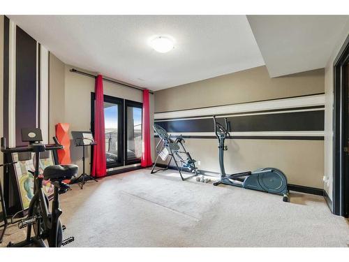 43 Cranleigh Manor Se, Calgary, AB - Indoor Photo Showing Gym Room