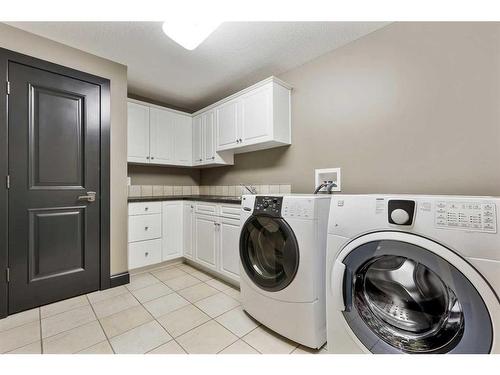 43 Cranleigh Manor Se, Calgary, AB - Indoor Photo Showing Laundry Room