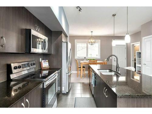 336 Cranfield Common Se, Calgary, AB - Indoor Photo Showing Kitchen With Stainless Steel Kitchen With Double Sink With Upgraded Kitchen