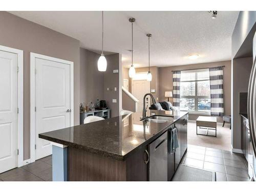 336 Cranfield Common Se, Calgary, AB - Indoor Photo Showing Kitchen With Double Sink With Upgraded Kitchen