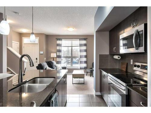 336 Cranfield Common Se, Calgary, AB - Indoor Photo Showing Kitchen With Stainless Steel Kitchen With Double Sink With Upgraded Kitchen