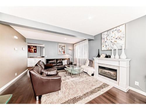 127 Abalone Way Ne, Calgary, AB - Indoor Photo Showing Living Room With Fireplace