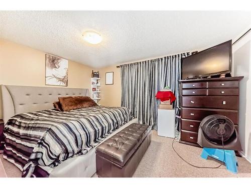 127 Abalone Way Ne, Calgary, AB - Indoor Photo Showing Bedroom