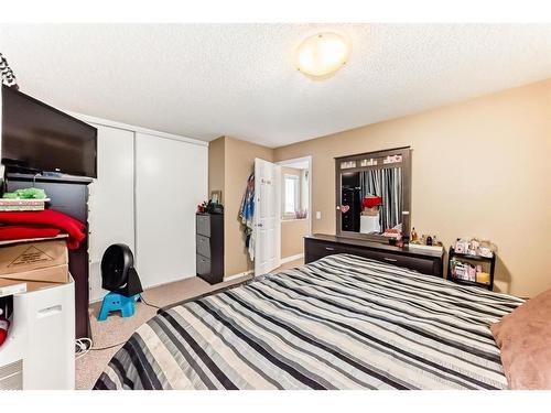 127 Abalone Way Ne, Calgary, AB - Indoor Photo Showing Bedroom