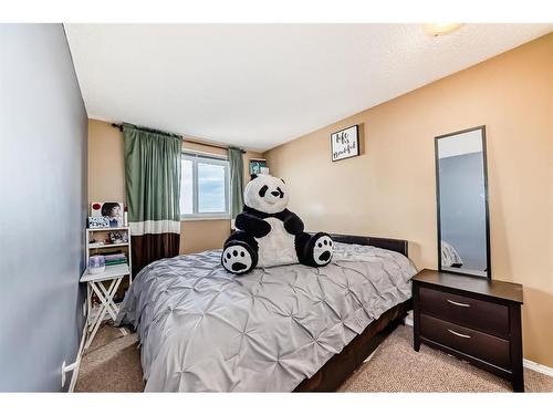 127 Abalone Way Ne, Calgary, AB - Indoor Photo Showing Bedroom