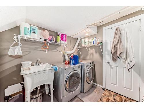 127 Abalone Way Ne, Calgary, AB - Indoor Photo Showing Laundry Room