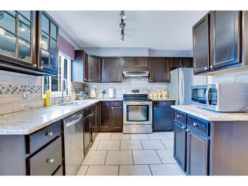 198 Hidden Valley Villas Nw, Calgary, AB - Indoor Photo Showing Kitchen With Stainless Steel Kitchen