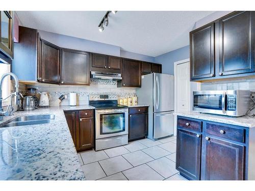 198 Hidden Valley Villas Nw, Calgary, AB - Indoor Photo Showing Kitchen With Stainless Steel Kitchen With Double Sink