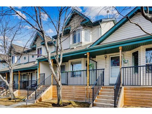 198 Hidden Valley Villas Nw, Calgary, AB - Outdoor With Deck Patio Veranda With Facade