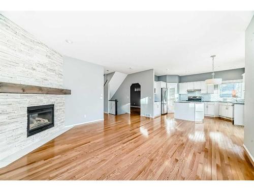 18 Coral Reef Crescent Ne, Calgary, AB - Indoor Photo Showing Living Room With Fireplace