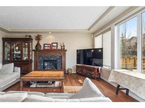 156 Auburn Sound Circle Se, Calgary, AB - Indoor Photo Showing Living Room With Fireplace