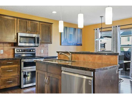 304 New Brighton Place Se, Calgary, AB - Indoor Photo Showing Kitchen With Stainless Steel Kitchen